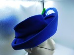 blue hat green feather good a